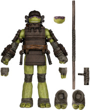 Load image into Gallery viewer, Teenage Mutant Ninja Turtles Page Punchers Donatello Figure Turtles in Time
